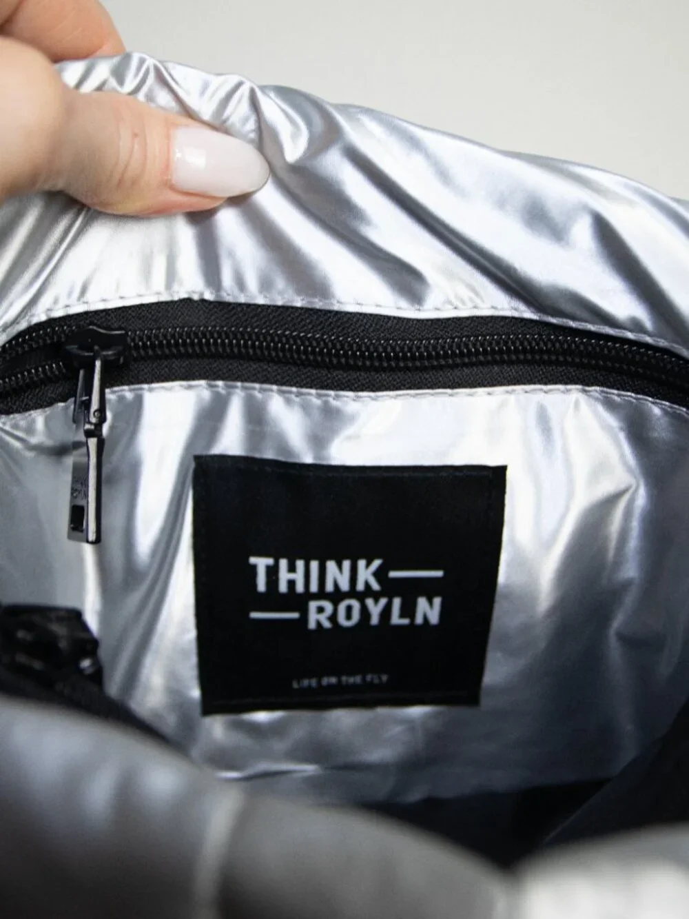 Think Royln Bar Bag Silver Liquid Metallic Puffer Bag